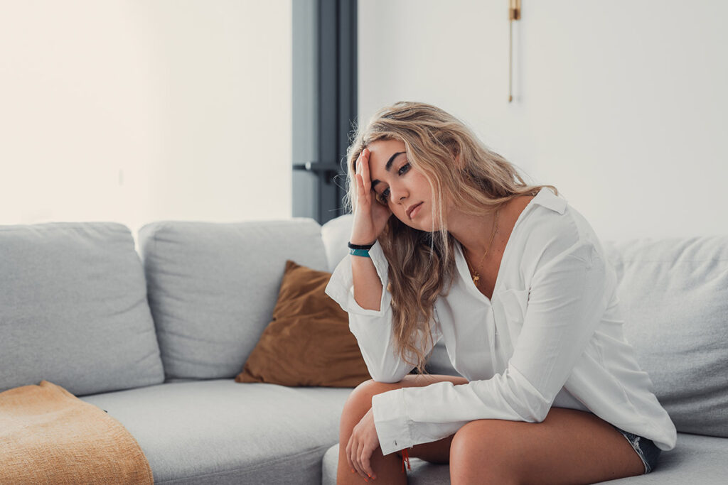 Woman thinking about the short-term effects of heroin