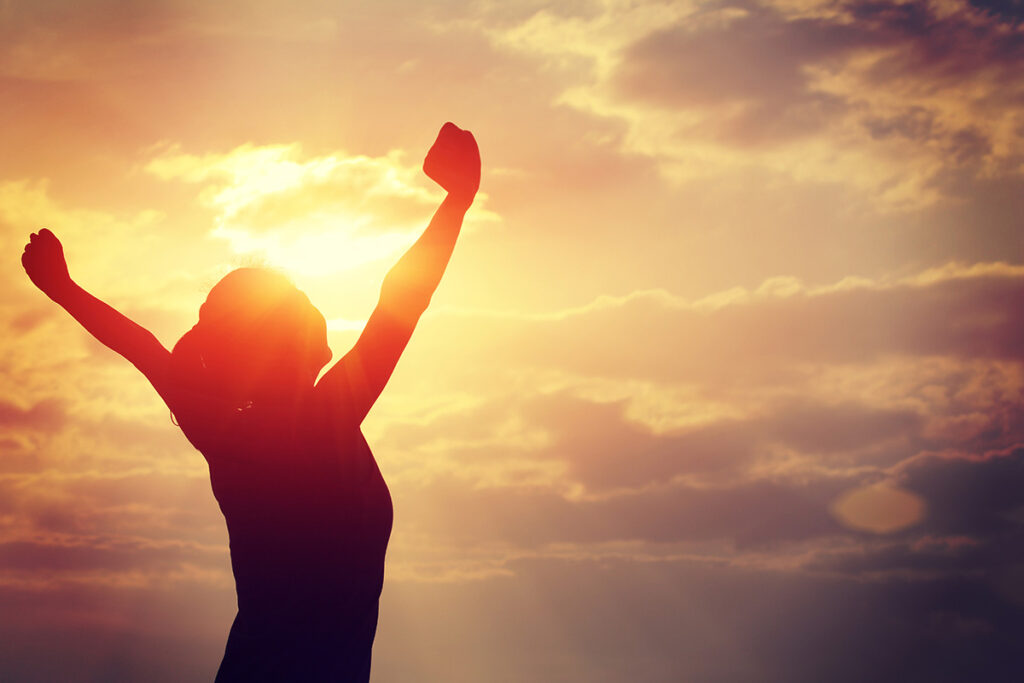 A woman happy that she is healing from trauma